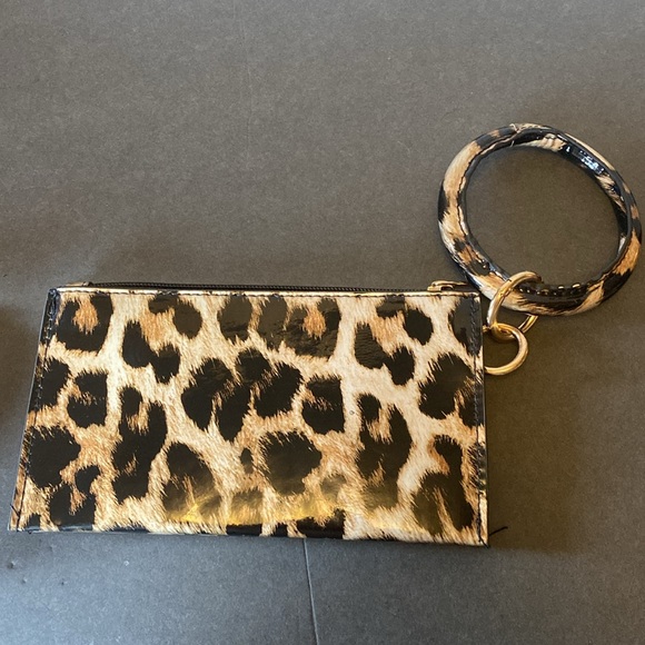 Bundle of three items. Two wristlets, and one eyeglass case. - Picture 6 of 10